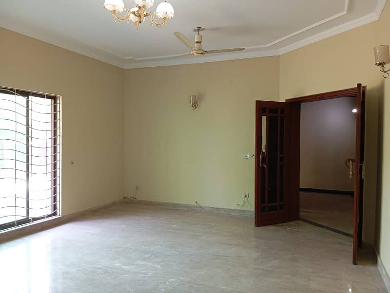 1 Kanal Beautiful House with 5 Beds and huge car parking is available for Rent in DHA Phase 4 ,Lahore 5