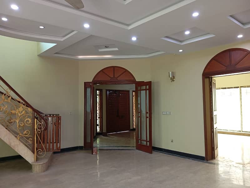 1 Kanal Beautiful House with 5 Beds and huge car parking is available for Rent in DHA Phase 4 ,Lahore 7