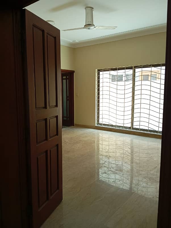 1 Kanal Beautiful House with 5 Beds and huge car parking is available for Rent in DHA Phase 4 ,Lahore 9