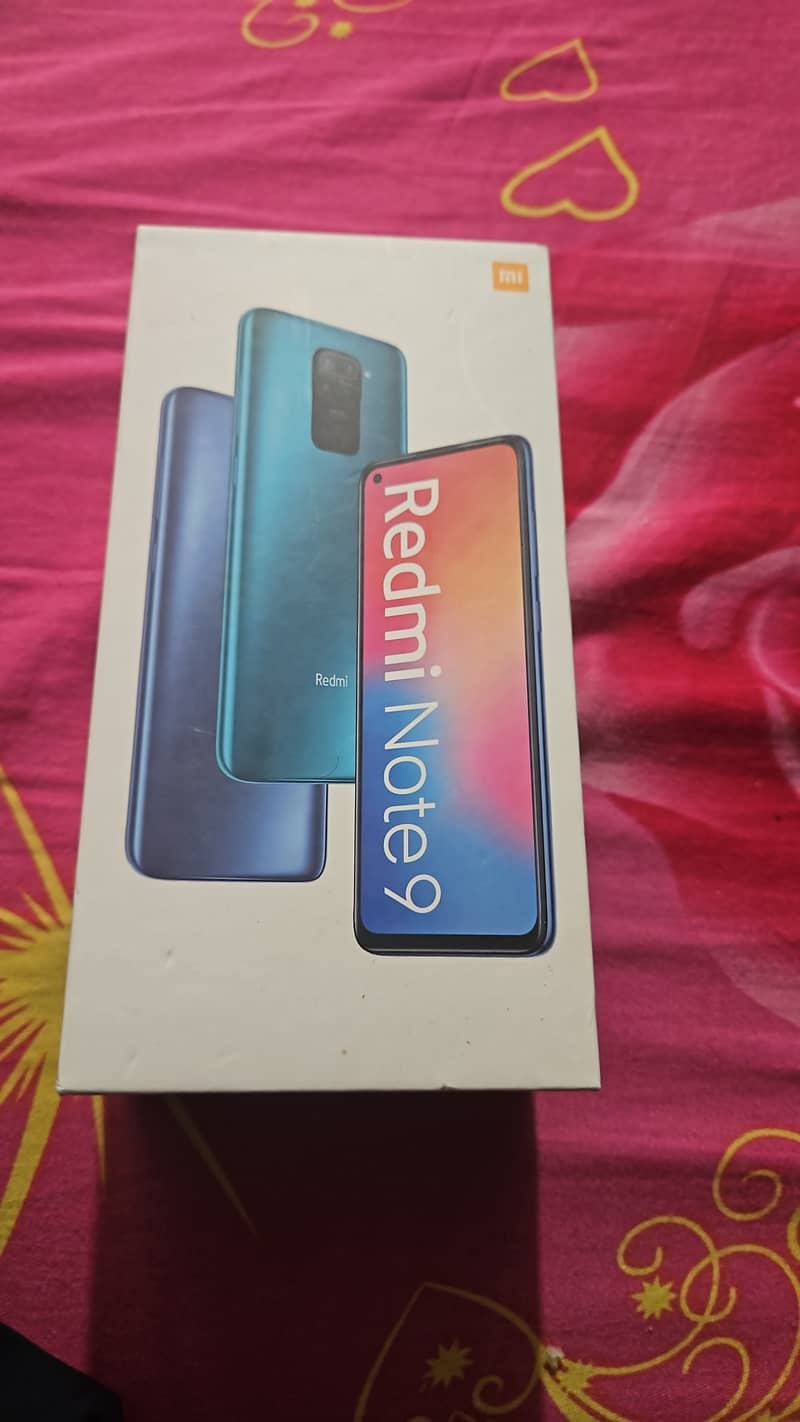 redmi note 9 6gb 128gb with box and charger. 5