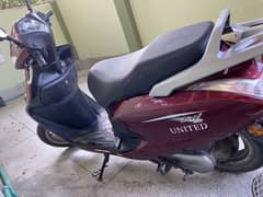 United scooty 100cc marron 0