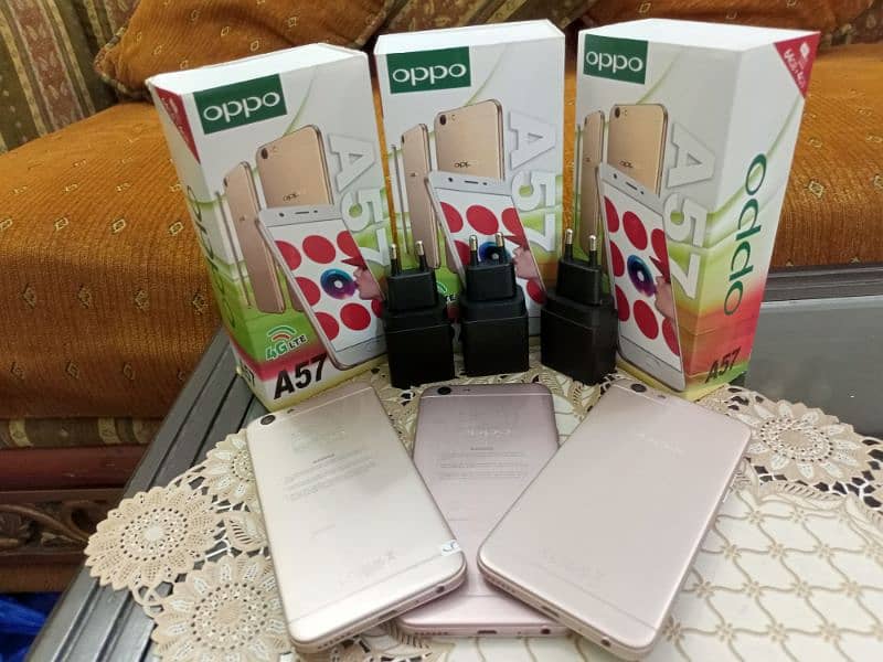 OPPO A57 WITH BOX AND CHARGER. PTA LIFETIME. 4/64.10/10 NEW condition 1