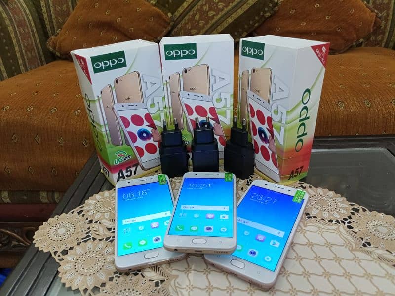 OPPO A57 WITH BOX AND CHARGER. PTA LIFETIME. 4/64.10/10 NEW condition 6