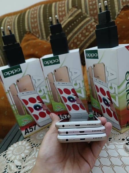 OPPO A57 WITH BOX AND CHARGER. PTA LIFETIME. 4/64.10/10 NEW condition 8