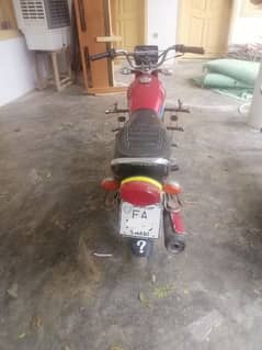 Honda cg 125 swabi reg 2 original plate number file copy by hand.