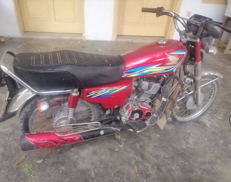 Honda cg 125 swabi reg 2 original plate number file copy by hand. 2