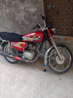 Honda 125 100% all over ok red color 0