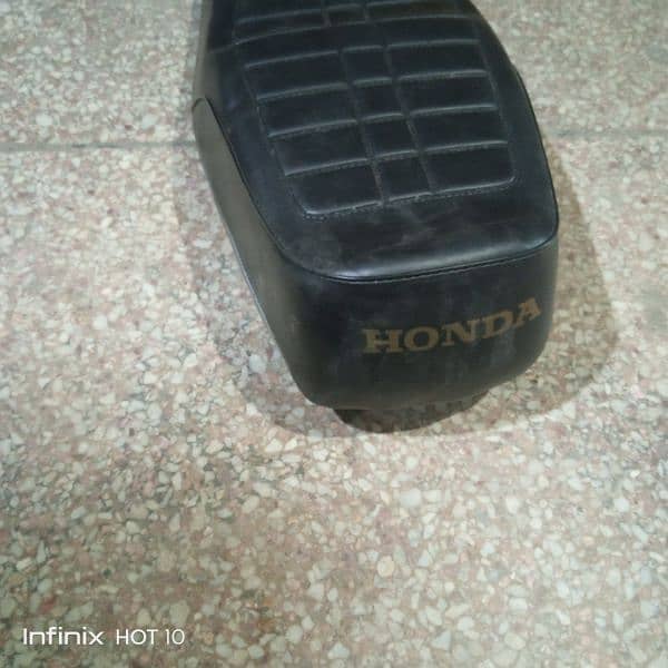 old model Genuine seat 2