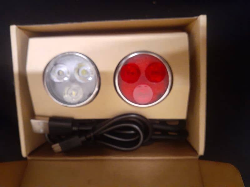 bicycle lights ( front and back both ) . with extra cable and locks 5