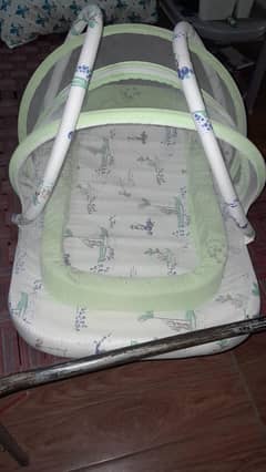 Baby foam/mattress bed with net cover in good condition.