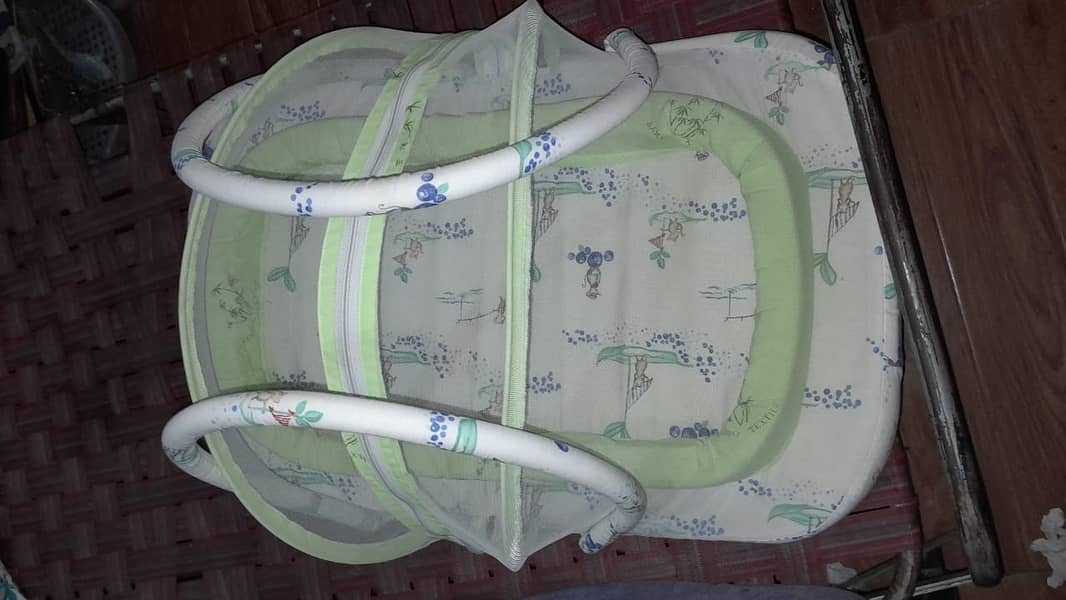 Baby foam/mattress bed with net cover in good condition. 2