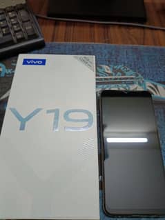 vivo y19 4/128 gb with box,original charger,wire.