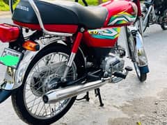 Red Honda CD70 model 2023 urgent for sale