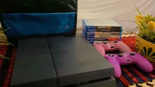 PS4 FAT WITH BAG AND 2 CONTROLLERS