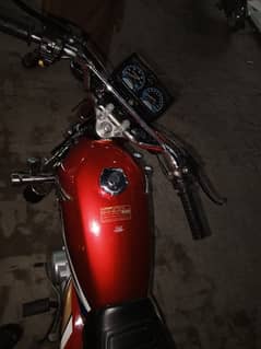 Bike Honda 125 Red colour condition 10 by 10