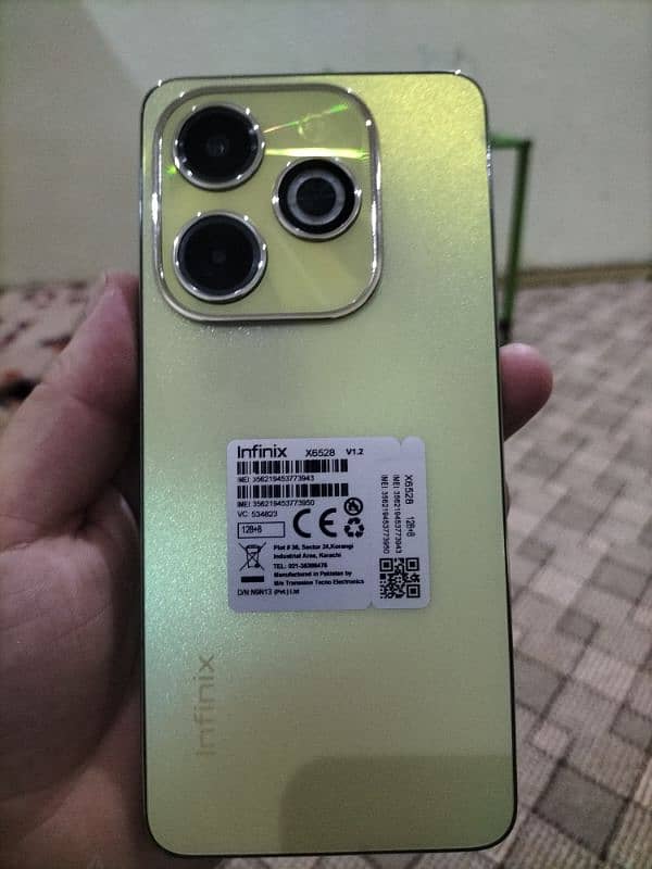 Infinix Hot 40i ,gold colour. 2