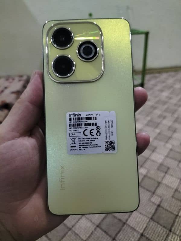 Infinix Hot 40i ,gold colour. 3