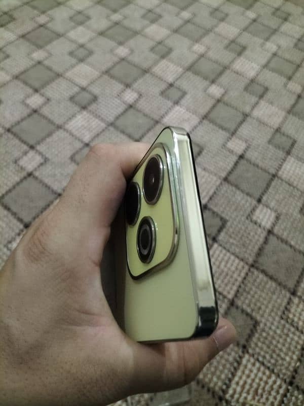 Infinix Hot 40i ,gold colour. 7