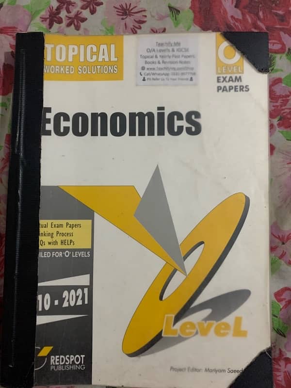 O level Economics Second edition by Susan Grant and topical past paper 3