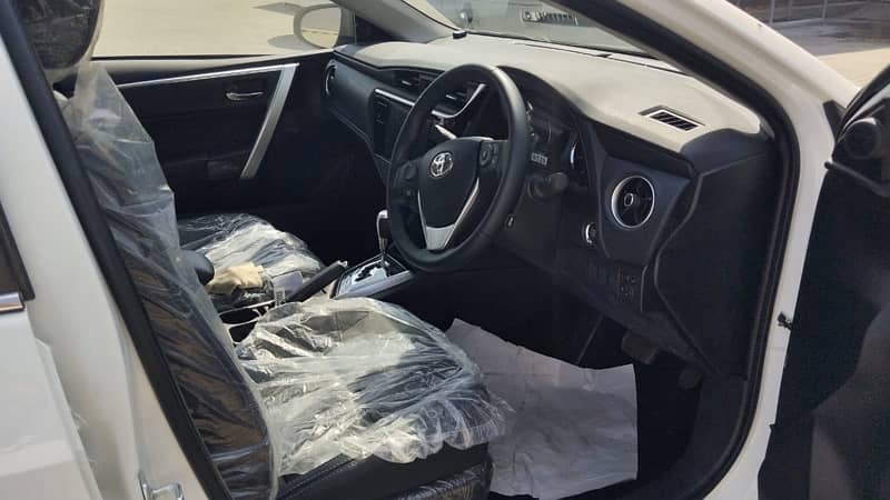 Toyota Altis Grande black interior 2024 2