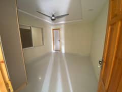 Proper 3bedrooms unfurnished apartment available for Rent in E 11 main margalla Road with separate Wapda Meter