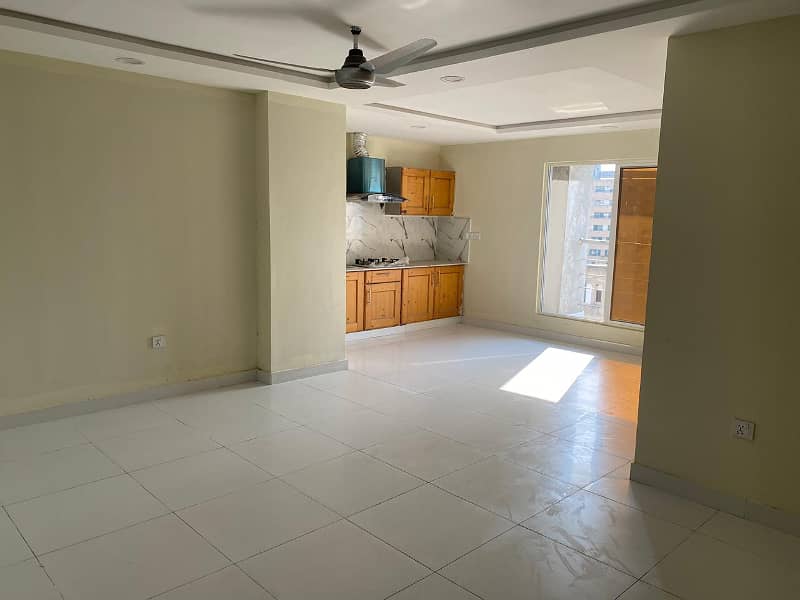 Proper 3bedrooms unfurnished apartment available for Rent in E 11 main margalla Road with separate Wapda Meter 5