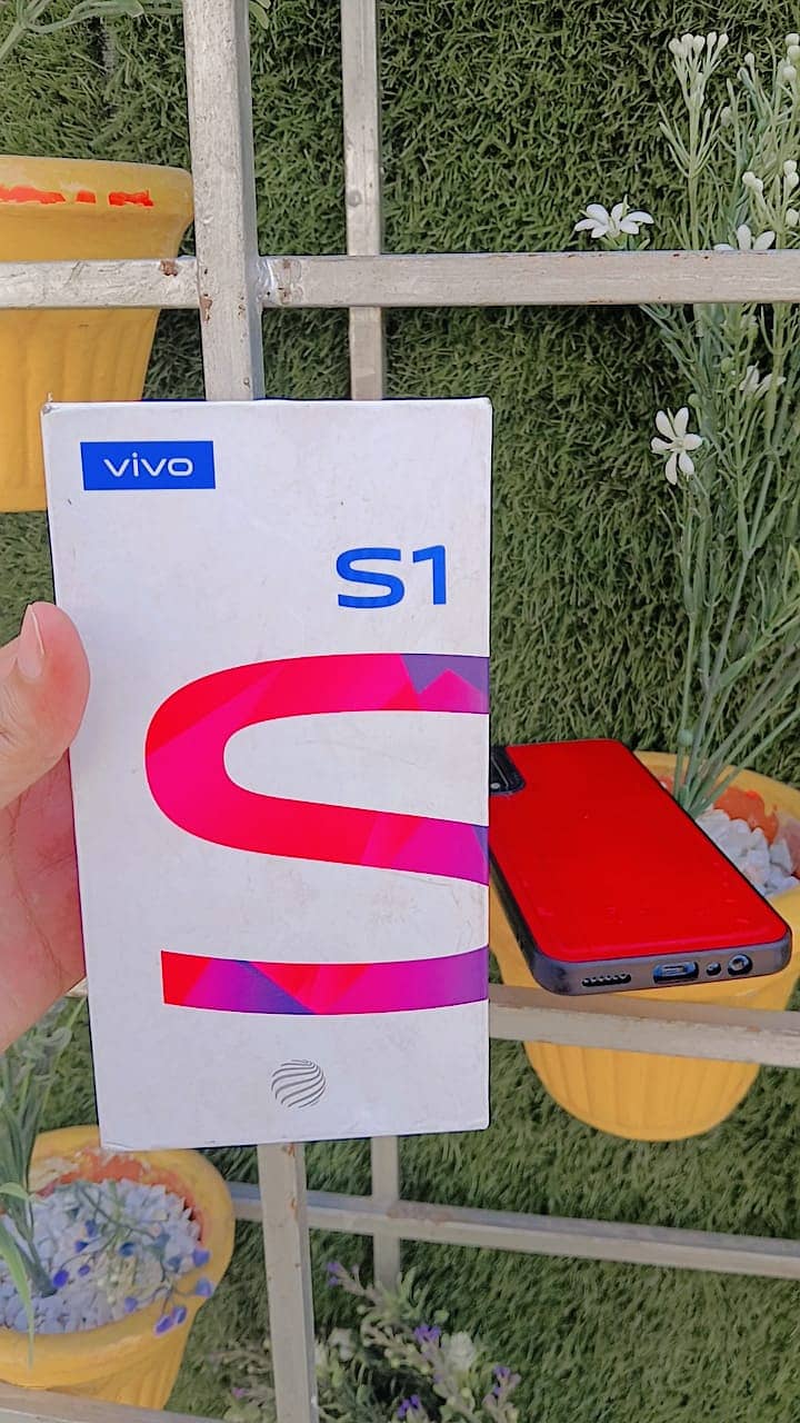 Vivo S1 with box charger lush condition one hand used. 5