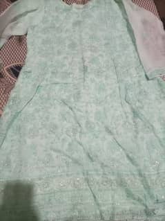 light sea green color dress. . 
frock. . . plate frock. . . . 0