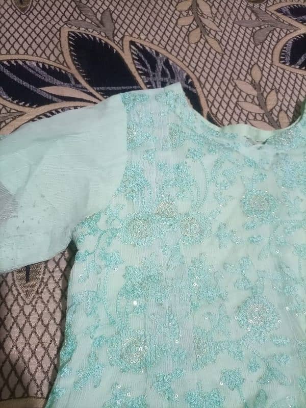 light sea green color dress. . 
frock. . . plate frock. . . . 1