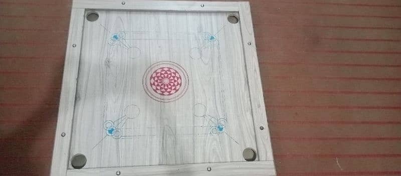 Like new carrom board . 1