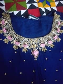 ready to wear blue frock with pink paplum nd blue dupta