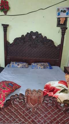 Double bed with two side table and dressing table in wooden.