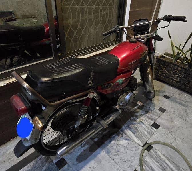 Road prince red bike, cd 70. registered lahore 0