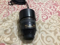 Nikon85mm1.4g All Ok One hand used Sharp lens