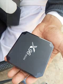 X 96 mini Smart/Android TV box with assesories.