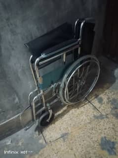 folding wheel chair  (0 3 2 2 6 6 6 7 7 7 9 ) 0