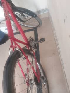 10/10 condition new , gear changer red colour bicycle.