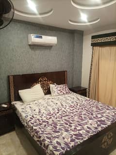 2 BEDROOMS FULLY LUXURY AND FULLY FURNISH IDEAL LOCATION EXCELLENT FLAT FOR RENT IN BAHRIA TOWN LAHORE 0