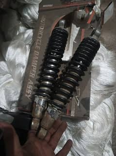 Honda deluxe 125 k shocks hain