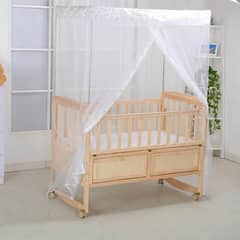 Baby cot with swing and mosquito net