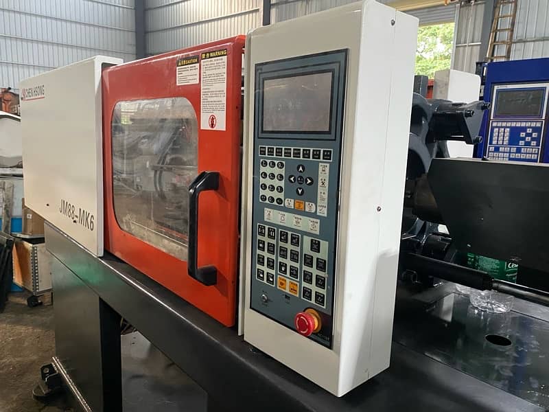 Injection moulding machine JM 128 MK 6 2019 servo 14