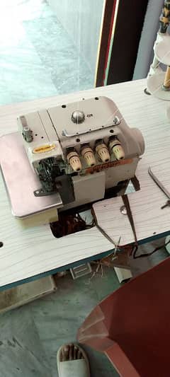 Over lock machine  model siruba made in Japan