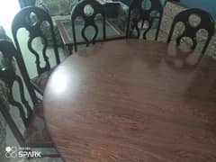 round dining table with 5 chairs