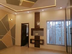 Ideal 10 Marla House Available In Tariq Gardens - Block C, Lahore 0