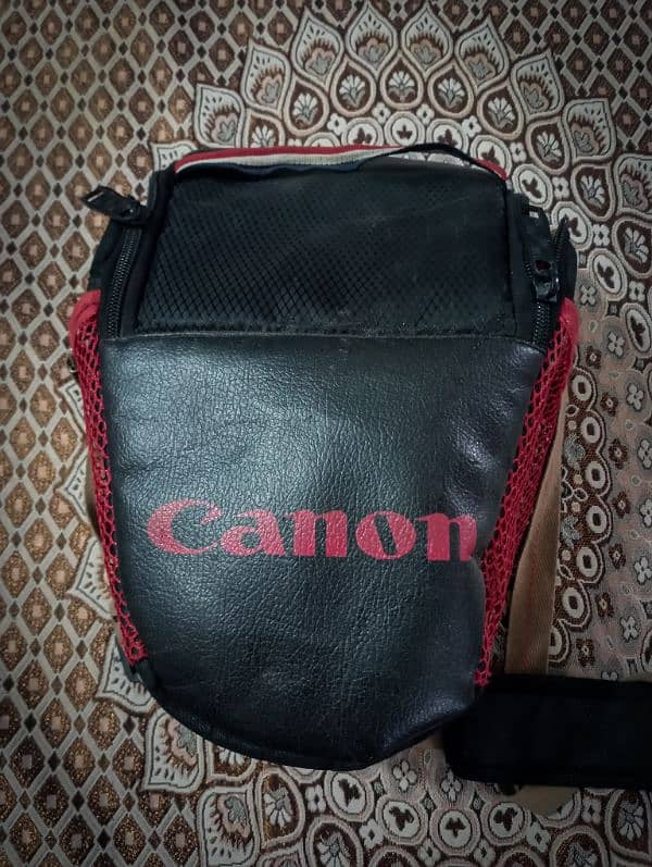 Canon EOS Kiss X5 DSLR + 18-55mm Lens with Bag & Strap - For Sale 9