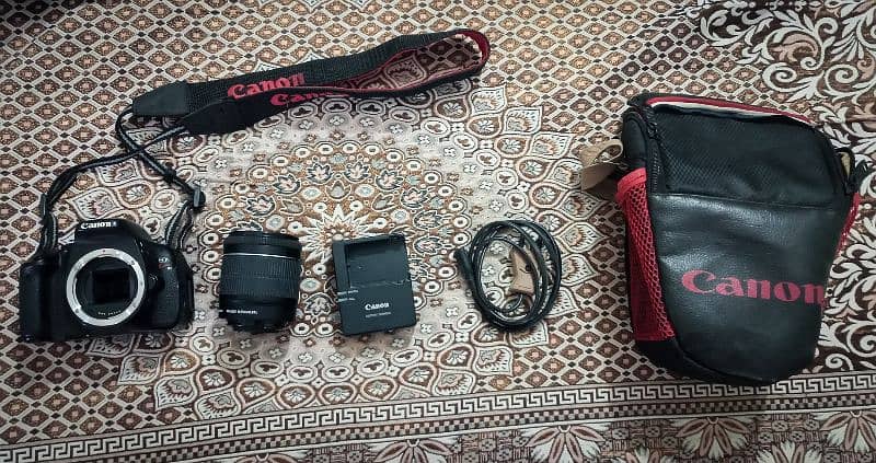 Canon EOS Kiss X5 DSLR + 18-55mm Lens with Bag & Strap - For Sale 10