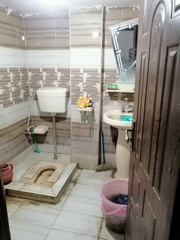 Upper portion with two bedrooms available for boys bachelors in model town link road 1