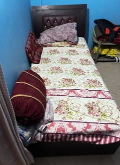 Selling single bed with double mattress