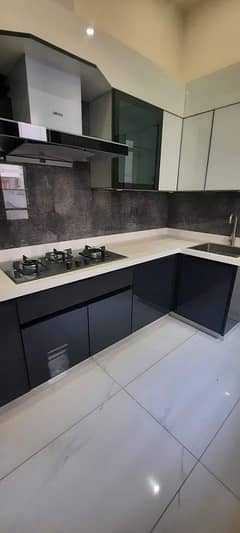 kitchen cabinet and granite marble