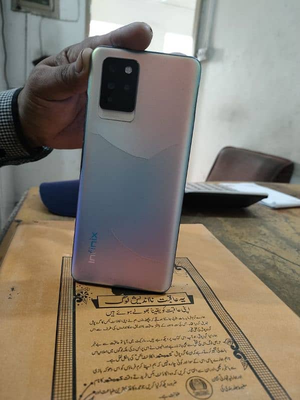 Infinix not 10 pro back side pr nishan ha 4